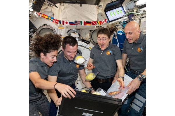 Image Four astronauts.